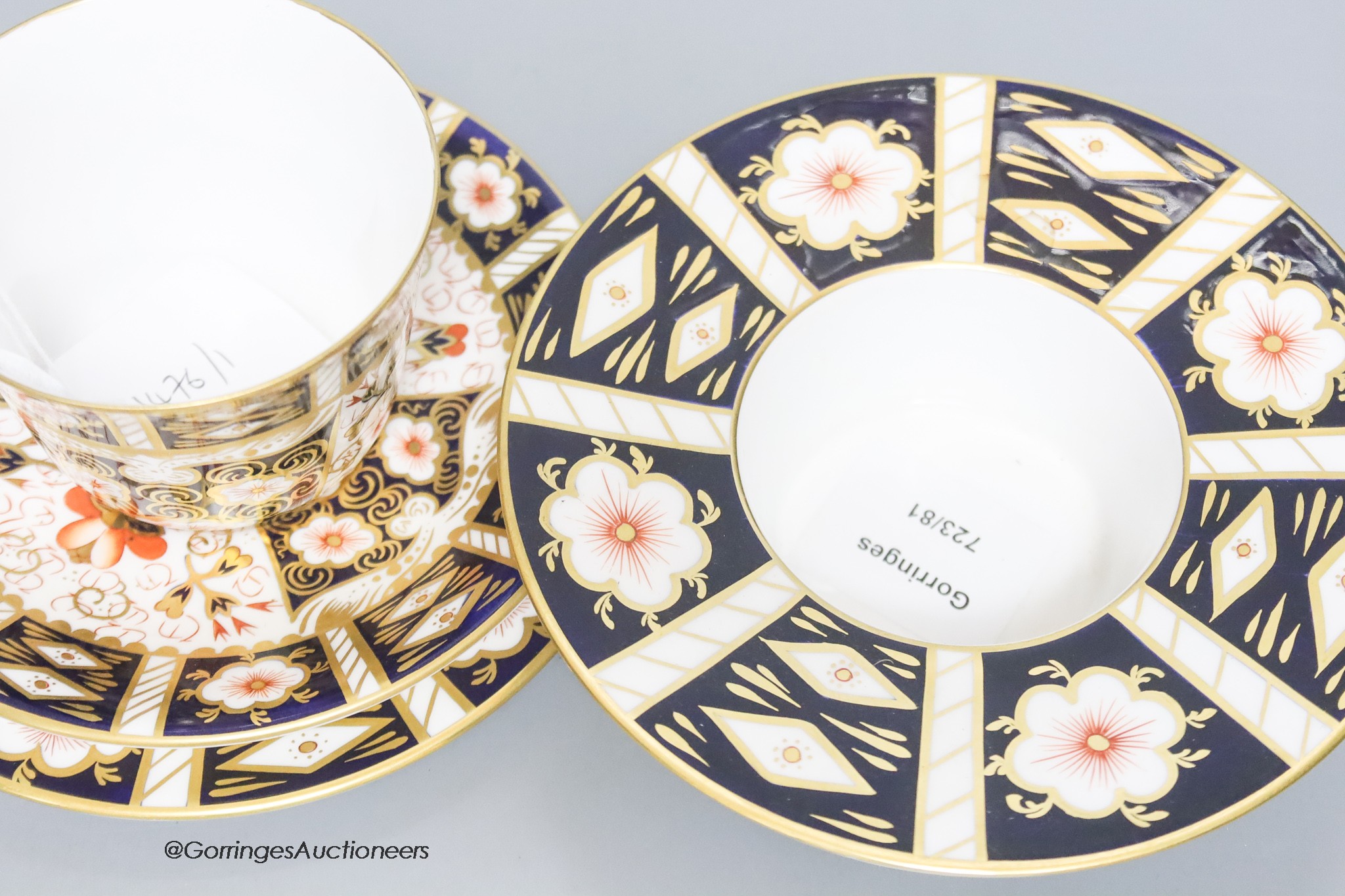 A quantity of Royal Crown Derby cups, plates and dishes